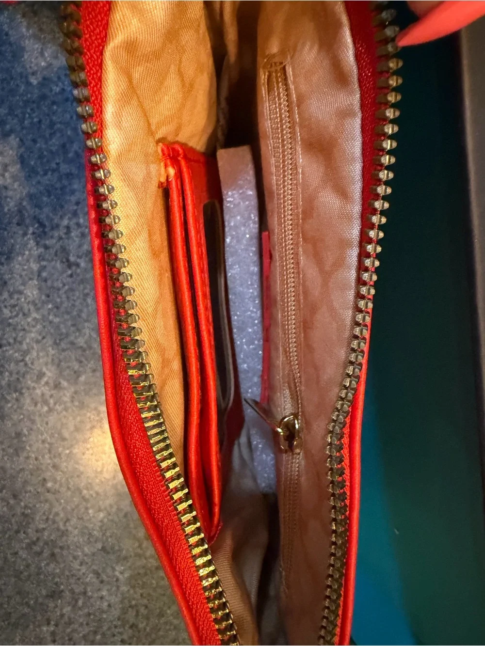 Red-Orange Laser-Cut Wristlet Clutch by Wonder